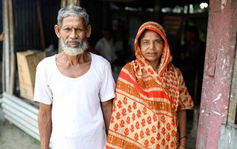 A old couple  standing  with smile 